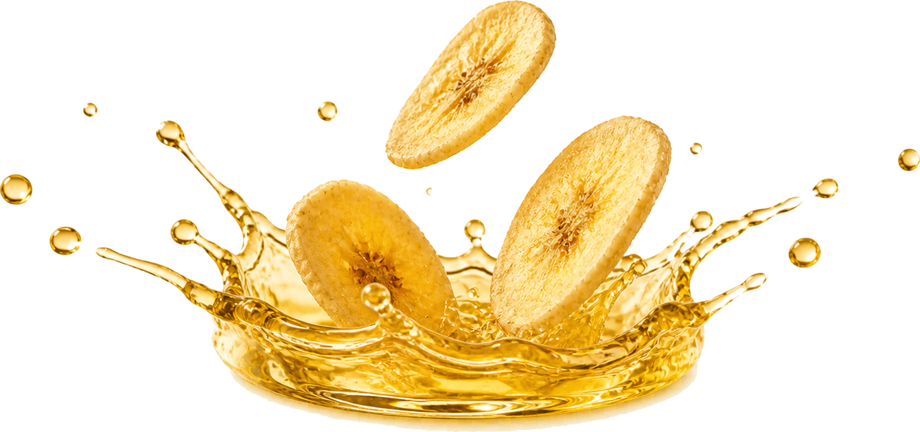 Plantain slices splashing into coconut oil